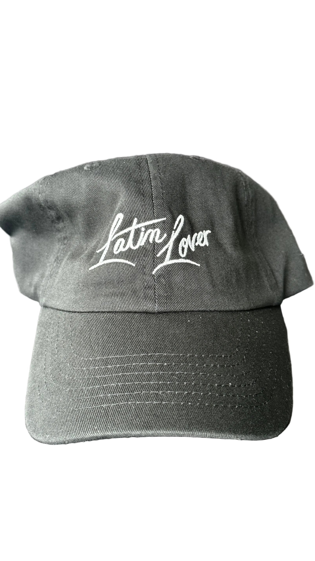 A black baseball cap with 'Latin Lover' embroidered in white script across the front